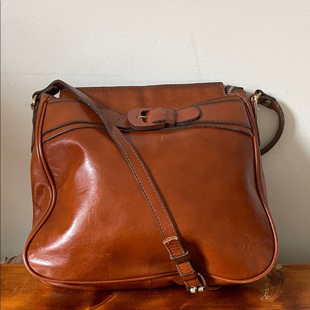 Patricia Nash Leather Saddle Crossbody Bag with Buckle Detail in Cognac - Picture 2 of 9